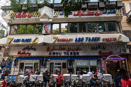 View of the Abo Tarek, a famous Koshery restaurant serving the most popular Egyptian food, Downtown, Cairo. Cairo, Egypt's sprawling capital located on the banks of the River Nile, known in Arabic as Al Qahirah, meaning 'The Victorious' is an ever-expanding megacity with a population of over 20 million people.