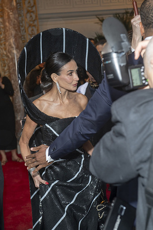 New York, United States - 05/05/2025 17:29:05: Demi Moore wearing Thom Browne departs the Pierre Hotel for 2025 Met Gala in New York City.