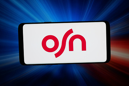 In this photo illustration, the media company Orbit Showtime Network (OSN) logo is seen displayed on a smartphone in front of abstract background on computer screen.