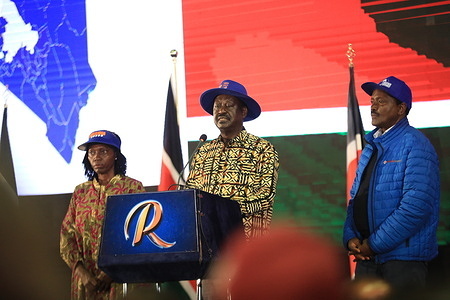 Azimio la Umoja One Kenya coalition presidential candidate Raila Odinga (C) alongside his running mate Martha Karua (L) and former Kenya's vice president Kalonzo Muysoka (R) speaks during a press conference at KICC buildings. The former prime minister rejected the presidential results announced by Independent and Boundaries Electoral Commission (IEBC) chairman Wafula Chebukati who announced his opponent William Samoei Ruto as the winner.