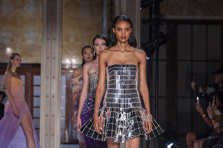 Models walk the runway finale for the Pamella Roland fashion show during Spring 2026 New York Fashion Week at the New York Public Library.