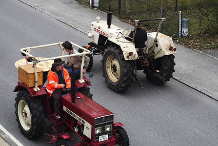 Close view of a vintage tractor highlights details seen during the Easter parade.