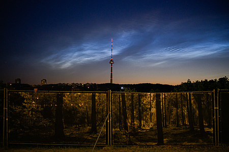 Noctilucent clouds, also known as night-shining clouds, seen from Vilnius. This cloud-like phenomenon in the upper atmosphere layers, at heights of 70-90 kilometers, from the ground is only visible during astronomical twilight.
