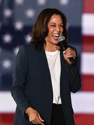 Democratic vice presidential nominee Kamala Harris speaks at a drive-in rally on the first day of early voting in Florida at the Central Florida Fairgrounds.