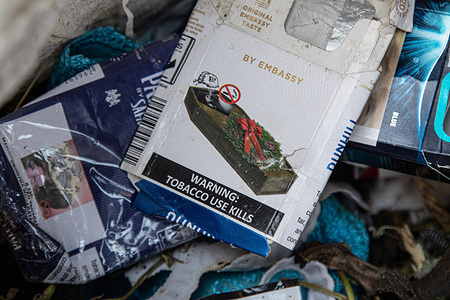 In this photo illustration, an empty packet of Dunhill Cigarettes with a health warning written 'Tobacco Use Kills' and a coffin symbol printed on it. A study conducted by researchers at California’s UC Davis Comprehensive Cancer Center says nearly half of the deaths from 12 cancers are due to tobacco use.
