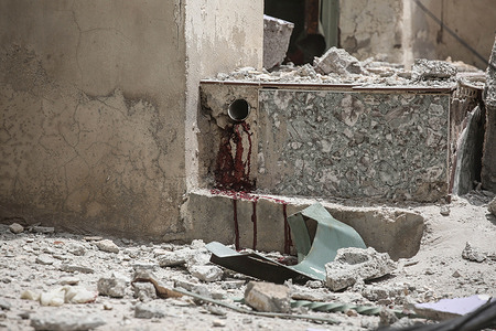 Blood is seen flowing from the sewage system during the military operation. The Israeli army surrounded a building during a military operation that killed five Palestinians who had barricaded themselves inside it. An exchange of fire erupted between Palestinians and the Israeli army, in the town of Tammun, north of the Jordan Valley in the West Bank.