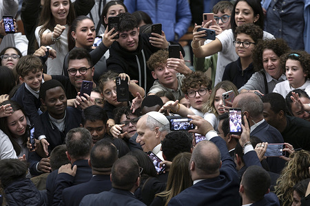 Pope Leo XIV greets the faithful at the end of the meeting with students who participated in the Jubilee of the World of Education at the Paul VI hall.