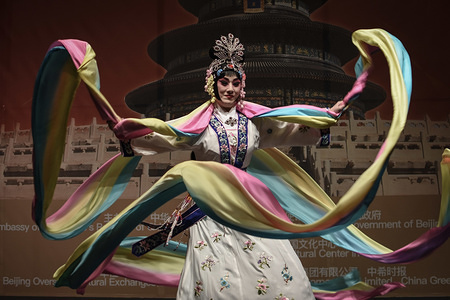 A woman seen performing the traditional chinese dance with a large multicolored scarf during the 'Chinese New Year - Night of Beijing' event.
The Beijing National Orchestra holds the ‘Chinese New Year - Night of Beijing’ event ahead of the Chinese New Year on February 16th, 2018. Various performance were made by the Beijing Acrobat Theater and the Academy of Dance as well as a presentation of Martial Arts.