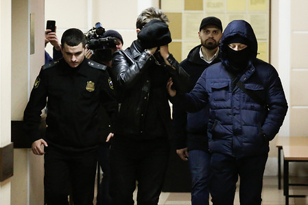 Georgy Chernyshev (C) suspected for plotting a Christmas terrorist attack brought for a closed-door detention hearing at Dzerzhinsky District Court. Vladimir Putin thanked Donald Trump for a tip that foiled Russian terror plot.