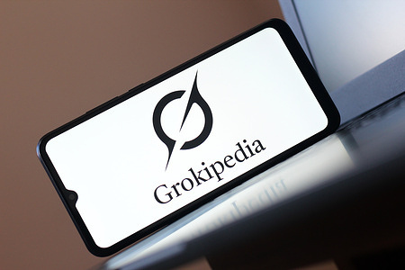 In this photo illustration, the Grokipedia logo is seen displayed on a smartphone screen.