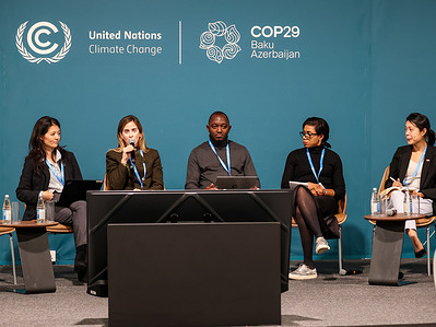 Reina Otsuka, Digital Innovation for Nature and Climate UNDP and Gemma Torras Vives, Climate Change Specialist, World Bank attend a panel discussion during the United Nations Climate Change Conference COP29, an event held by UNFCCC in Baku Olympic Stadium. COP29, running from November 11-22, focuses on climate financing.