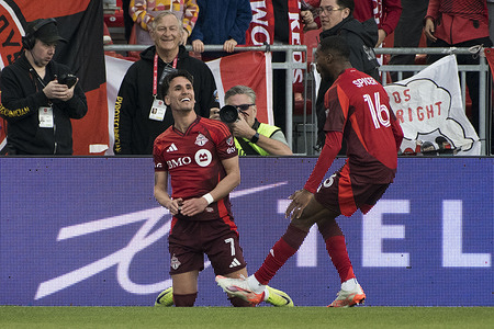 Theo Corbeanu #7 (L) celebrates after scoring a goal during the Canadian Championship game between Toronto FC and CF Montreal at BMO field. Final score Toronto FC 2 : 2 CF Montreal