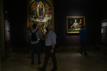 Visitors are seen at the entrance of the Capodimonte Museum during the exhibition.
The exhibition "Raffaello a Capodimonte: l’officina dell’artista" (Raphael in Capodimonte: the artist’s laboratory) opened on 10 June 2021 and will continue until 13 September 2021. Curated by Angela Cerasuolo and Andrea Zezza, the exhibition shows the artists’ artworks and restored materials kept in the museum; commemorating the painter on the 500th anniversary of his death.