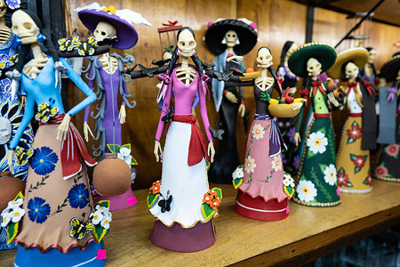 Day of the dead Caterinas are being displayed at a market stall in Mexico City.
Day of the Dead objects from the markets in Mexico City. Typically these objects are used to create shrines in the houses together with photos of deceased loved ones.