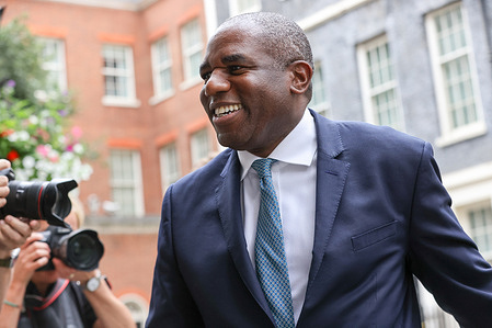 British Foreign Secretary, David Lammy (L) departs from No 10 Downing Street in Westminster, London.
