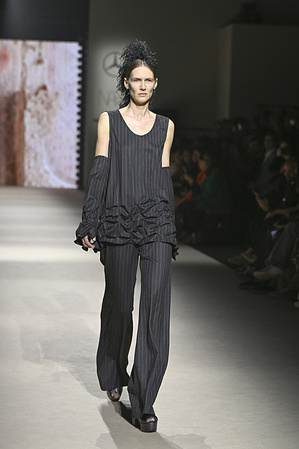 A model walks the runway wearing a design by Fely Campo during Mercedes-Benz Fashion Week de Madrid in IFEMA.