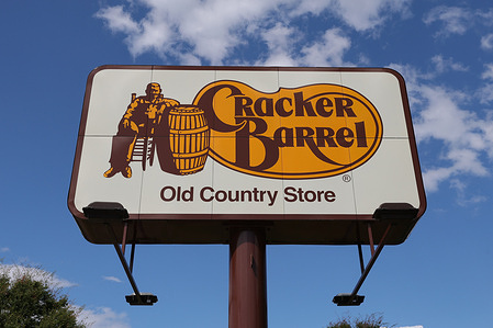 The Cracker Barrel logo is seen on a billboard outside of one of its restaurants.