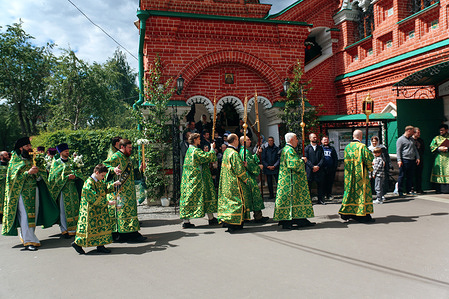 Members of the Orthodox clergy attend a service on the Feast of the Holy Trinity outside of Holy Trinity Church. Trinity Sunday is a major Christian holiday celebrating the revelation of the Holy Trinity: the Father, the Son (Jesus Christ), and the Holy Spirit. It commemorates the descent of the Holy Spirit upon the Apostles, often considered the "birthday" of the Christian Church.