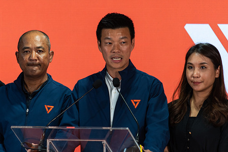 Natthaphong Ruengpanyawut (C), prime ministerial candidate of the People's Party, speaks to the media during the press conference to concede the Thailand's general election of the People's Party at the party's headquarters in Bangkok.