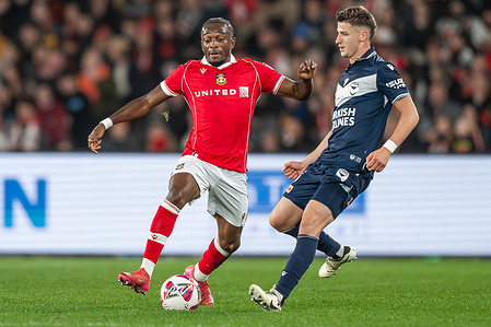Sebastian Revan of Wrexham AFC and Josh Inserra of Melbourne Victory seen in action during the game between Melbourne Victory and Wrexham AFC at Marvel Stadium. Final score Wrexham AFC 3 : 0 Melbourne Victory