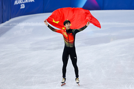 Long Sun of China celebrates winning the Silver medal during the Short Track Speed Skating Finals Men's 1000m of the Milano Cortina 2026 Winter Olympics at Milano Ice Skating Arena in Milan.