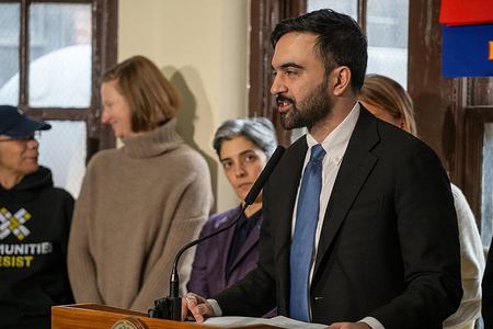New York City Mayor Zohran Mamdani announces a $2.1 million settlement involving A&E Real Estate properties to address tenant harassment and hazardous conditions across 14 buildings in Brooklyn, Manhattan, and Queens during a press briefing in the Queens Borough of New York City.