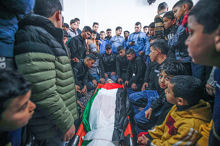 (EDITOR'S NOTE: Image depicts death)Relatives bid farewell during the funeral of 16-years-old Palestinian Montaser Shawa, who died of his wounds sustained during an Israeli army operation on February 8, 2023, in Balata refugee camp, east of Nablus, in the occupied West Bank.