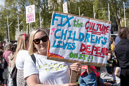 A protester holds a placard during the demonstration on the Parliament Square. Patients, families, supporters and advocates gathered on the Trafalgar Square to do a symbolic march to the Parliament Square in London, UK. Protesters try to raise awareness about the eating disorders at the society. Also, they demand from the British government to reform the system.