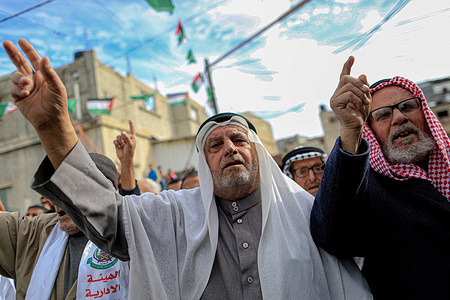 Palestinians chant slogans during a demonstration in solidarity with Jerusalem and Al-Aqsa Mosque in the southern Gaza Strip. Fearing the visit of the new Israeli Minister of National Security, Itamar Ben Gvir, to the Al-Aqsa Mosque in early January, while the Hamas movement that rules the Gaza Strip warned earlier of such a move would be a "red line".