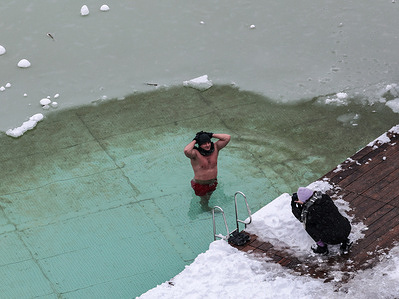People enjoy the Sunday cold water swim in Zakrzowek, a man-made lake in central Krakow. Ice swimming is growing in popularity in Poland as the winter of 2026 becomes one of the coldest in years, with temperatures dropping to as low as −25°C in parts of the country.
