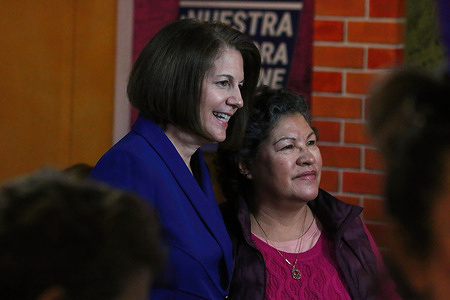 Senator Cortez Masto poses with a Latino supporter in Las Vegas after giving a victory speech earlier in the day. Nevada Senator Catherine Cortez Masto celebrates her reelection with Las Vegas Latino community members.