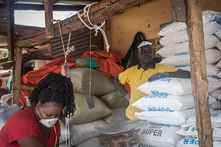 A trader wearing a face mask as a preventive measure against the spread of coronavirus works at a food store in Gulu.
So far only 33 people have been confirmed to be infected with COVID-19 in Uganda, and less than 5,000 across Africa. The government of Uganda has imposed restrictions on business, education and travel, where public transport was banned for at least 2weeks and people were advised to stay at home as a preventive measure against the spread of coronavirus.