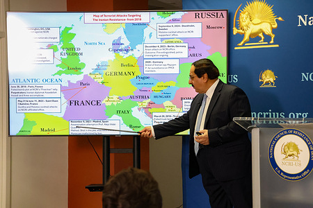 Alireza Jafarzadeh, Deputy Director of the NCRI-U.S. Representative Office, is seen presenting intelligence exposing the Iranian regime’s command structure behind extraterritorial terrorism. The National Council of Resistance of Iran-U.S. Representative Office held a press conference unveiling detailed intelligence on the Iranian regime’s overseas terrorist command structure.