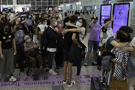 People farewell their friends and families as they depart to the UK.As the deadline of "Leave outside the Rules" (LOTR) for BN(O) visa expires on July 21, there is a special allowance for HongKongers to apply for visa after landing in UK. The last two days, HongKongers rushed to leave their beloved city to immigrate to UK in different mood, Excited for future or hugging each other and weeps. Thousands of Hong Kongers are expected to leave for the UK and other democracies, as the city has been facing intensifying crackdown on human rights and freedom following China’s National Security Law, with impacts on its economy amid the COVID-19 pandemic.
