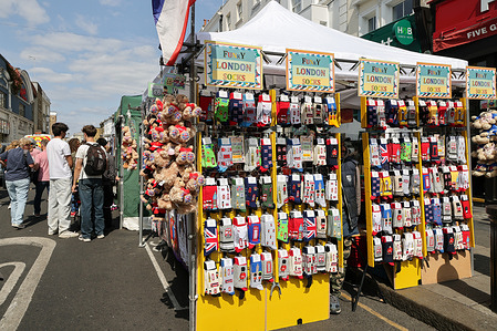 A stall in Portobello Road Market in Notting Hill. Portobello Road Market is a world-renowned street market in the heart of Notting Hill, West London. It's famous for its vibrant atmosphere and diverse offerings, most notably a huge selection of antiques.