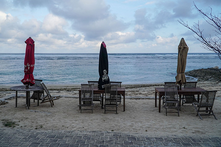 Closed restaurant terraces in Pandawa Beach during the coronavirus crisis.
Major tourism spots in Indonesia's resort island of Bali are still closed despite the local authority’s decision to reopen amid increasing Covid-19 cases. Domestic tourism has been reopened since July 31, 2020, while international tourism will be open in September 11, 2020.