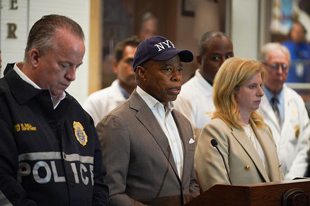 Eric Adams, New York City Mayor (C) is seen during a press conference on the active shooter situation at 345 Park Ave. Four victims, including an NYPD officer on "paid duty", were killed by the gunman who later died due to a self-inflicted gunshot wound to the chest. "Paid Duty" is when a company pays the NYPD for additional uniformed security.