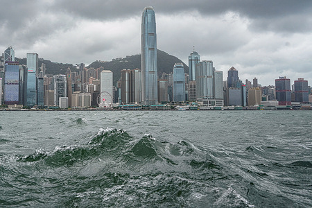 General view of Victoria Harbour during the No.8 Warning signal. In the early hours of July 17th, as Typhoon Talim approaches Hong Kong, the Hong Kong Observatory issues the Typhoon No.8 Warning signal at 12:40 a.m. This signal prompts significant changes throughout the city, with most bus services coming to a halt and the stock market closing its doors in response to the imminent danger. However, amidst these precautionary measures, the MTR (Mass Transit Railway) continues to provide limited subway services, ensuring that residents and travelers have a means of transportation during this critical time. During the No.8 Warning signal, some locals and travelers venture out in Tsim Sha Tsui and Heng Fa Chuen, eager to witness the force of Typhoon Talim firsthand. As the typhoon gradually weakens, the Hong Kong Observatory replaces the Typhoon No.8 Warning signal with the No.3 signal at 4:20 p.m.