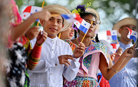 Panamanian Students wearing traditional outfits dance at a multicultural day festival.A Multicultural Parade and Festival was held to celebrate and integrate the community, the festival included live music, dance and food. Various ethnicities were represented and the community came out in support of the colorful event.