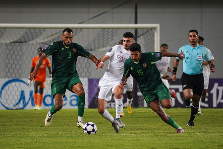 Al Shorta Iraqi defender Ahmed Yahya Al-Hajjaj (R) seen in action with Al Sadd Spanish forward Rafael Mujica (C) during the AFC Champions League Elite 2025-26 West Region Group Stage match between Al Shorta (IRQ) and Al Sadd Sc (QAT) at Al Zawraa Stadium. Final score Al Shorta 1 : 1 Al Sadd Sc
