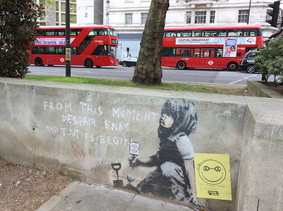 New Banksy 'masterpiece' on a wall in Marble Arch.
A new piece of 'Banksy' artwork left after the Extinction Rebellion protesters left Marble Arch last week could be worth £1 million. If genuine - and art experts claim it is definitely him - it could sell for around £1million, but only if it can be removed. Westminster Council have now placed a protective perspex plate over the piece of street art as it had already been the subject of some defacement with red and blue writing and a yellow 'smiley' leaflet stuck to the wall.