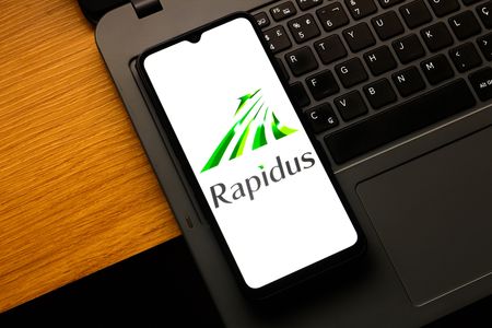 In this photo illustration, the Rapidus Corporation logo is seen displayed on a smartphone screen.