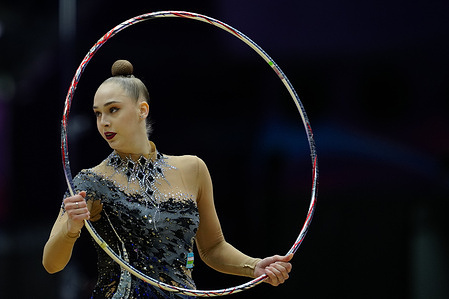 Natalya Usova of Uzbekistan performs her hoop routine during Individual Hoop Apparatus Final day three of the FIG World Challenge Cup at Beijing Indoor Stadium.