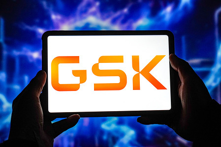 In this photo illustration, the GSK logo is displayed on the screen of a smart tablet.