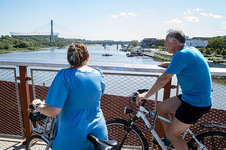 Varsovians look out over the historically low Vistula River. On the last weekend of summer, the longest river the Vistula, falls to its lowest-ever recorded level of just 7cm in the capital. The water level measured at the Vistula boulevards measuring station fell well below the minimum safe threshold of 150cm.