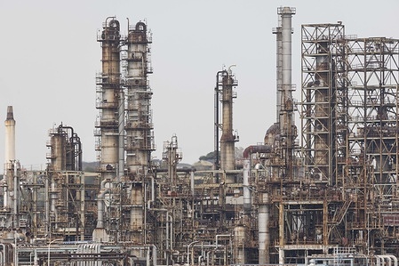 The Eneos Negishi refinery. In the context of the ongoing US-Iran war (which began with US-Israeli strikes on Iran in late February 2026), Japan's energy security—already precarious due to its negligible domestic oil reserves of around 44 million barrels—has come under acute strain.Iran's effective closure of the Strait of Hormuz in retaliation has disrupted roughly one-fifth of global oil flows, hitting Japan particularly hard. The country sources over 90-95% of its crude oil from the Middle East, with the vast majority transiting the strait. To mitigate shortages and soaring prices, Japan has undertaken its largest-ever release of strategic petroleum reserves. This includes an initial 80 million barrels (about 45 days of consumption) announced in mid-March, followed by additional drawdowns: private-sector stocks equivalent to 15 days and state-held reserves for another 30 days. The releases aim to stabilize domestic supply and prevent economic fallout amid the largest supply disruption in decades.