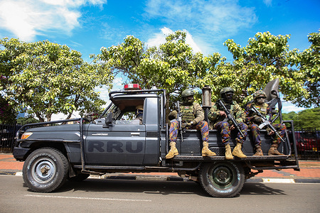 The Kenya's Rapid Response Unit (RRU) patrolling along parliament road before the arrival of President William Ruto (not pictured), amidst security concerns, at the Parliament building for his annual State of the Nation address. While addressing the nation, the president of Kenya announced canceling the recently signed 30-year deal with India's Adani Group, including ongoing plans for Adani's takeover of the Jomo Kenyatta International Airport (JKIA). This came after the indictment of its founder in the United States on bribery and fraud charges.