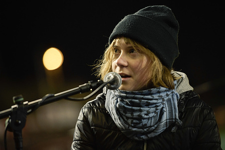 Greta Thunberg speaks in front of a large crowd at Dublin's Dalymount Stadium in conversation with fellow activists. Climate and Palestine activist Greta Thunberg in conversation with fellow humanitarian activist and Madeleine flotilla crew member Caoimhe Butterly, and Médecins Sans Frontières deputy medical co-ordinator for Gaza Dr. Mohammed Abu Mughessib at Dalymount Park, home ground of Bohemians F.C.