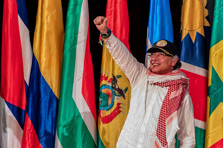 Colombian President Gustavo Petro gives a thumbs up to his crowd of supporters before his speech at the The Hague Group high-level ministerial meeting, New York Society for Ethical Culture. Colombian President Gustavo Petro addresses supporters in New York, moments before the U.S. State Department announced the revocation of his visa over his "incendiary" rhetoric. The controversy stems from Petro's demand that U.S. soldiers "disobey orders, and to not point their rifles at humanity" and his calls for a global army to intervene in Gaza.