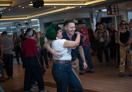A couple is seen embraced as they dance on the stage during the Rockin Race Jamboree Festival. Thousands of people from around the world gather every year during The Rockin' Race Jamboree International Festival for four days in Torremolinos, a meeting place for all lovers of rockabilly and swing music